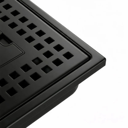 Close up of Veloaura 6-inch 304 stainless steel matte black square shower drain cover featuring a precision-cut grid pattern on a white background.